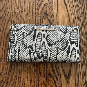 Rebecca Minkoff snake skin wallet.